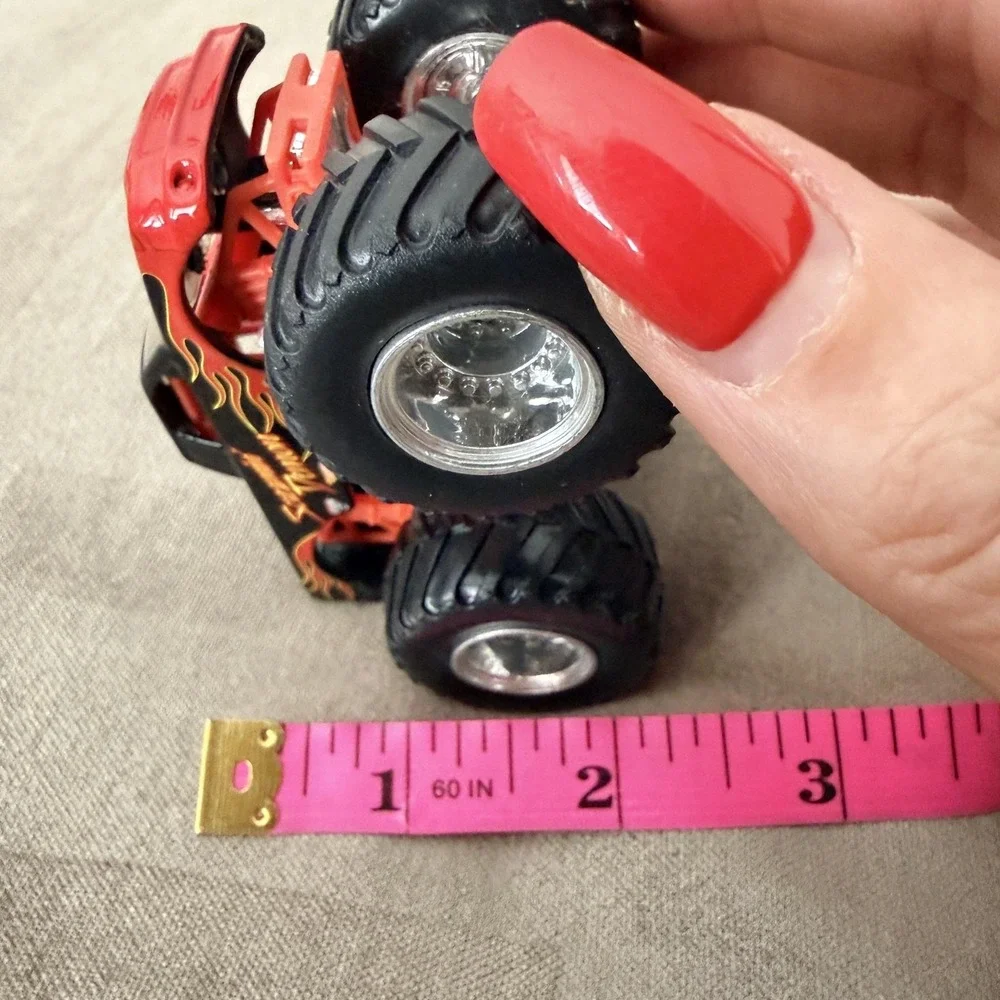 VTG 2006 Hot Wheels Screamin' Demon 1:64 Monster Jam Truck Toy Black Red Flames